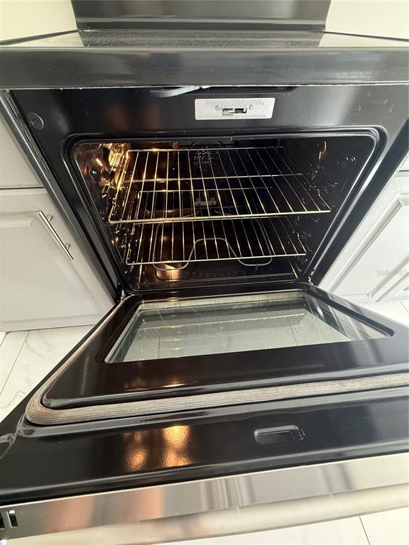 4688 Heather Terrace North Port, FL 34286 - Photo 15 of 35 a close view of stove