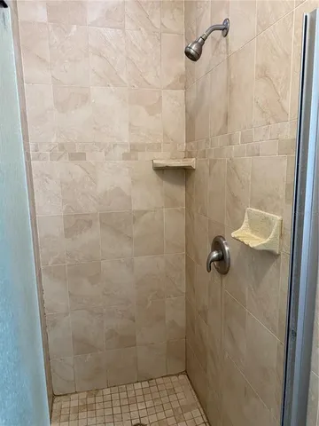 an empty room with wooden floor