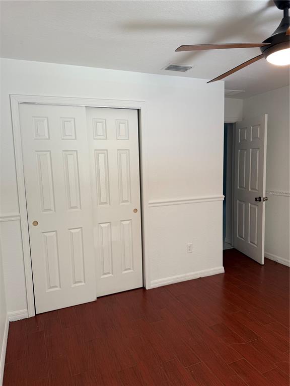 4688 Heather Terrace North Port, FL 34286 - Photo 27 of 35 an empty room with wooden floor