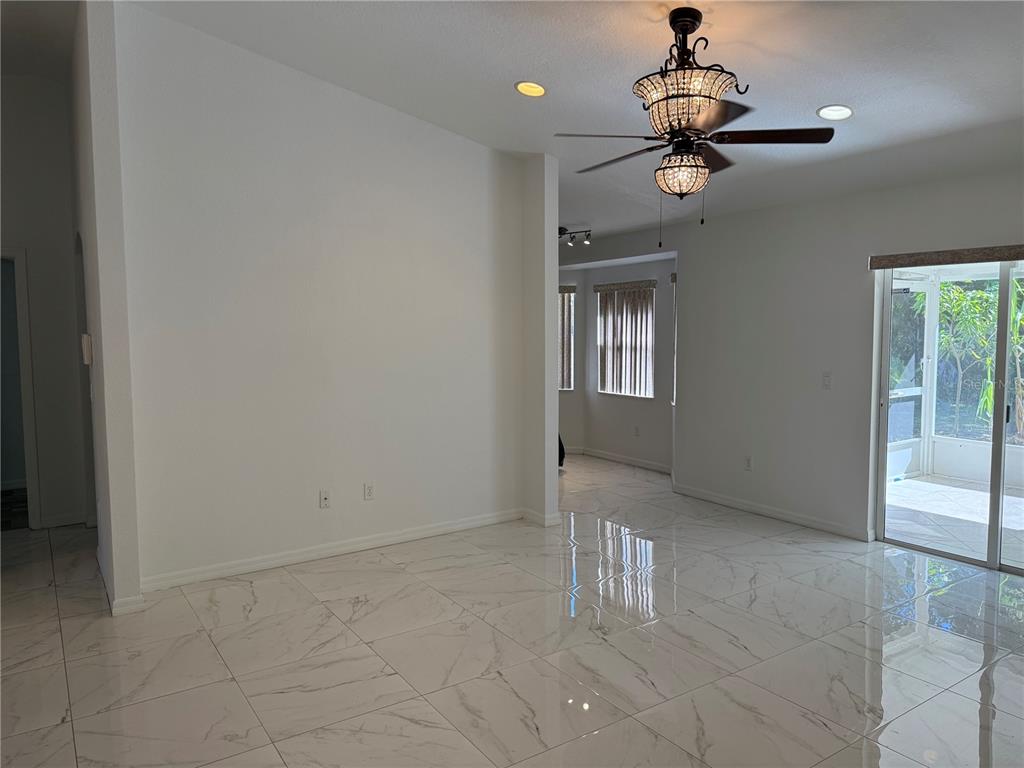 4688 Heather Terrace North Port, FL 34286 - Photo 9 of 35 a view of an empty room and a window