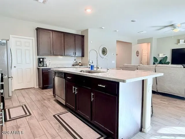 a kitchen with a sink and cabinets