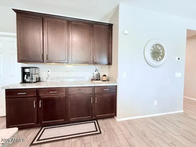 a view of cabinets with wooden floor
