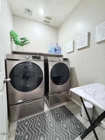 a kitchen with a chair and a stove