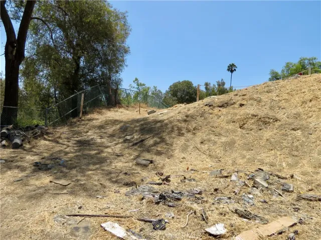 a view of a backyard of the house