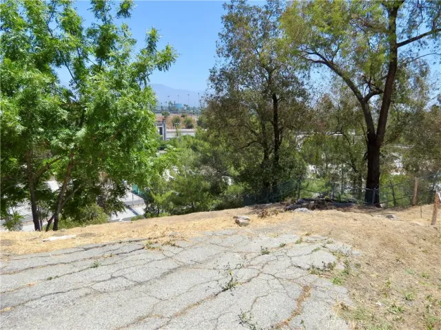 a view of snow on the side of a road