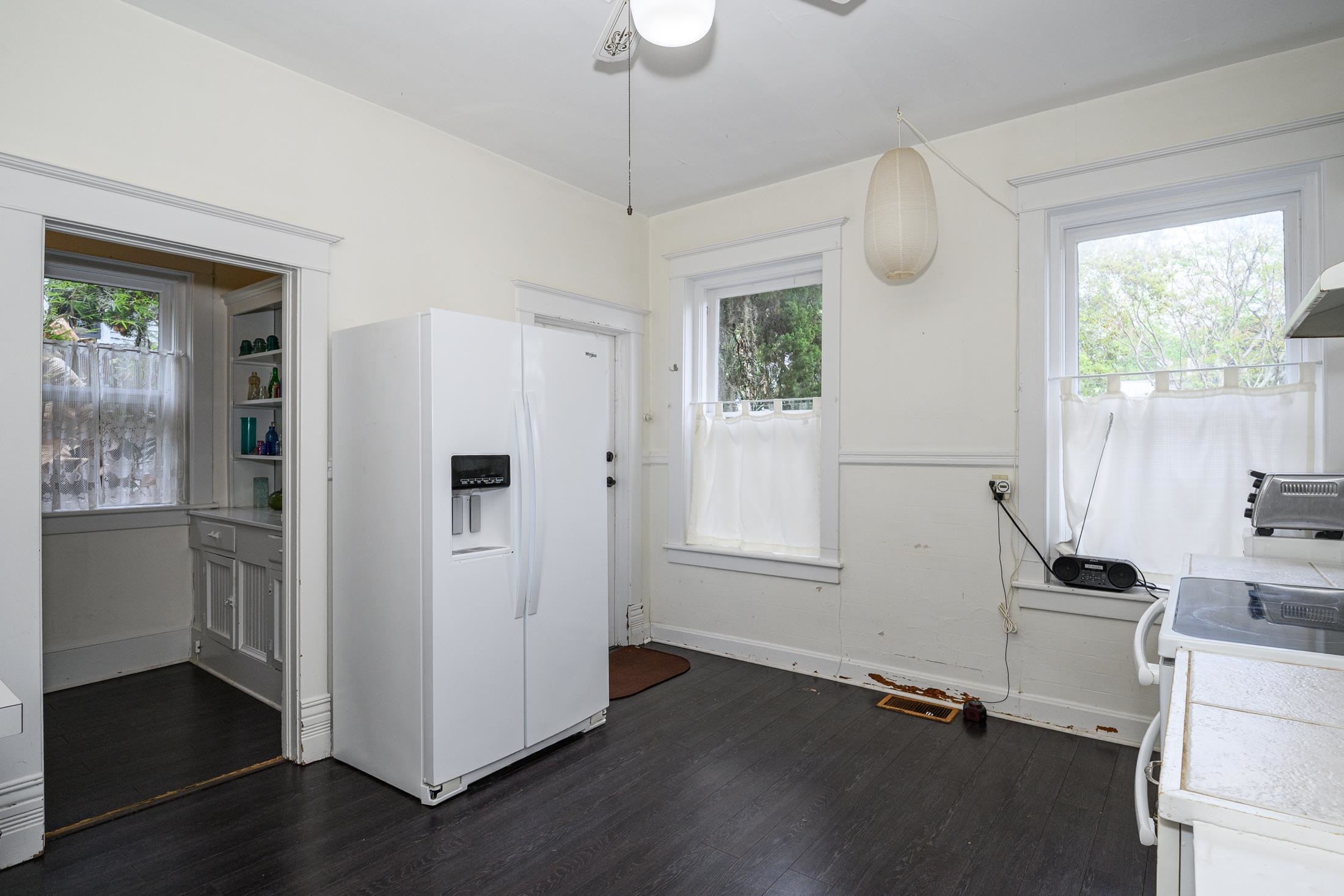 24 Saragossa Street St. Augustine, FL 32084 - Photo 59 of 99 a view of empty room with wooden floor and fan