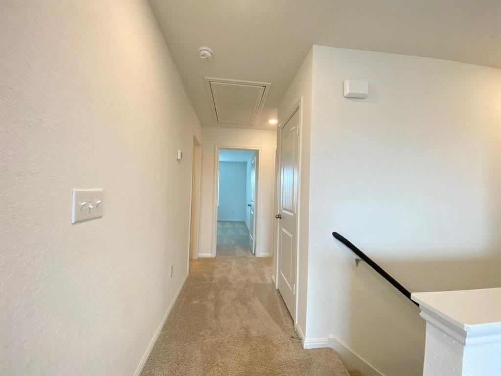 225 Saide Street Georgetown, TX 78626 - Photo 18 of 22 a view of a hallway with a hallway