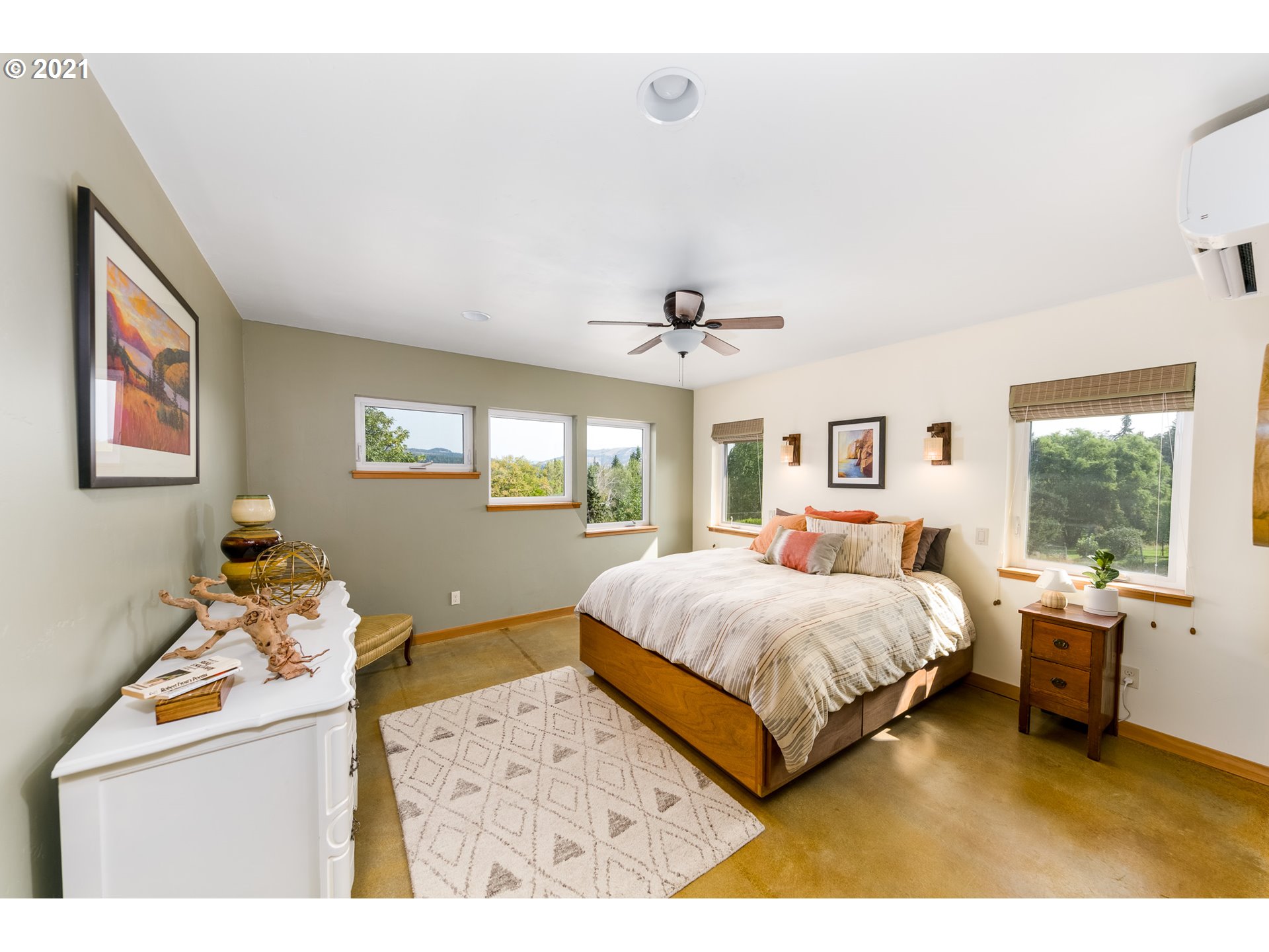 503 Frankton Road Hood River, OR 97031 - Photo 15 of 31 a bedroom with a bed and wooden floor