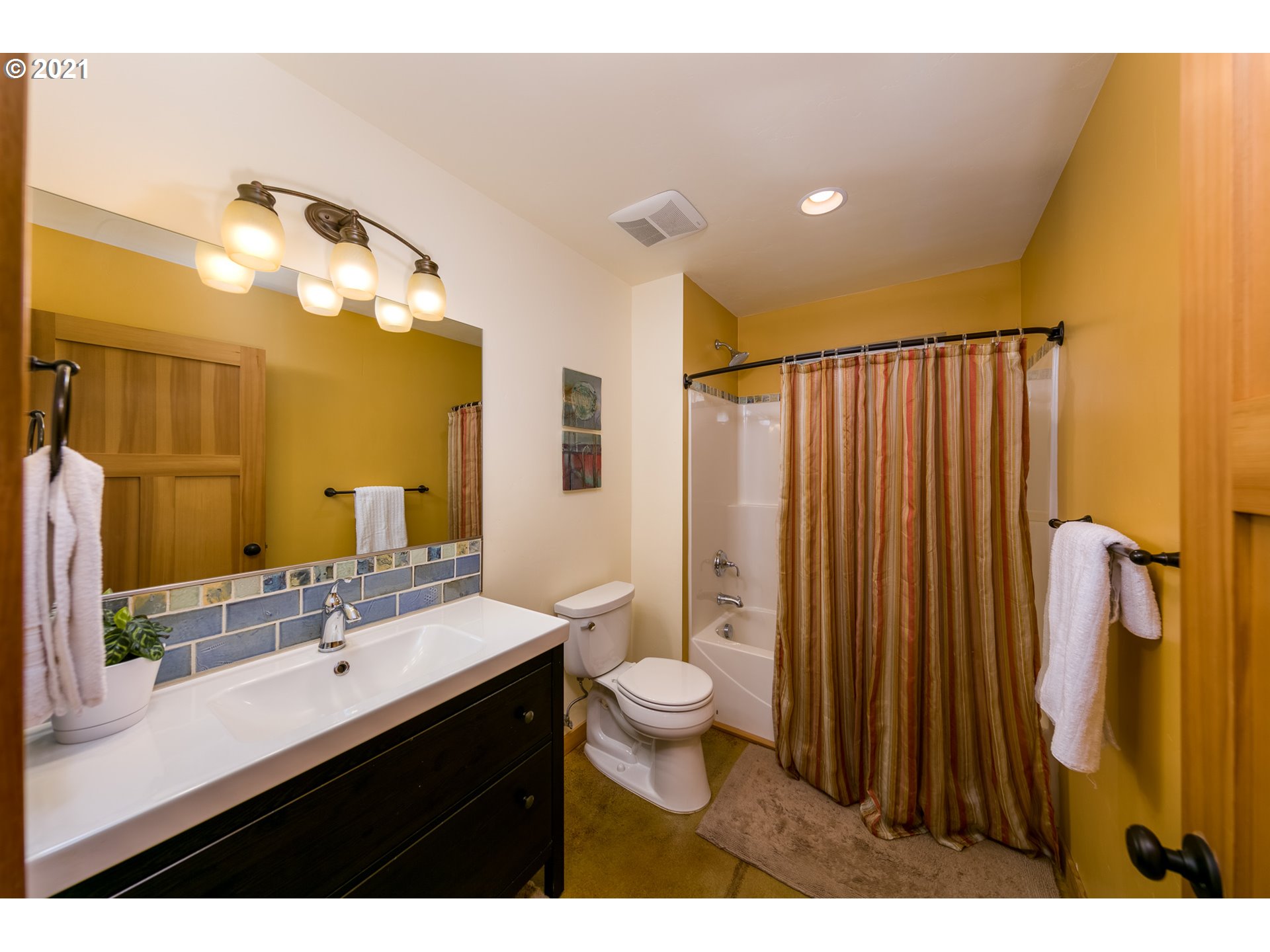 503 Frankton Road Hood River, OR 97031 - Photo 19 of 31 a bathroom with a sink vanity mirror and toilet