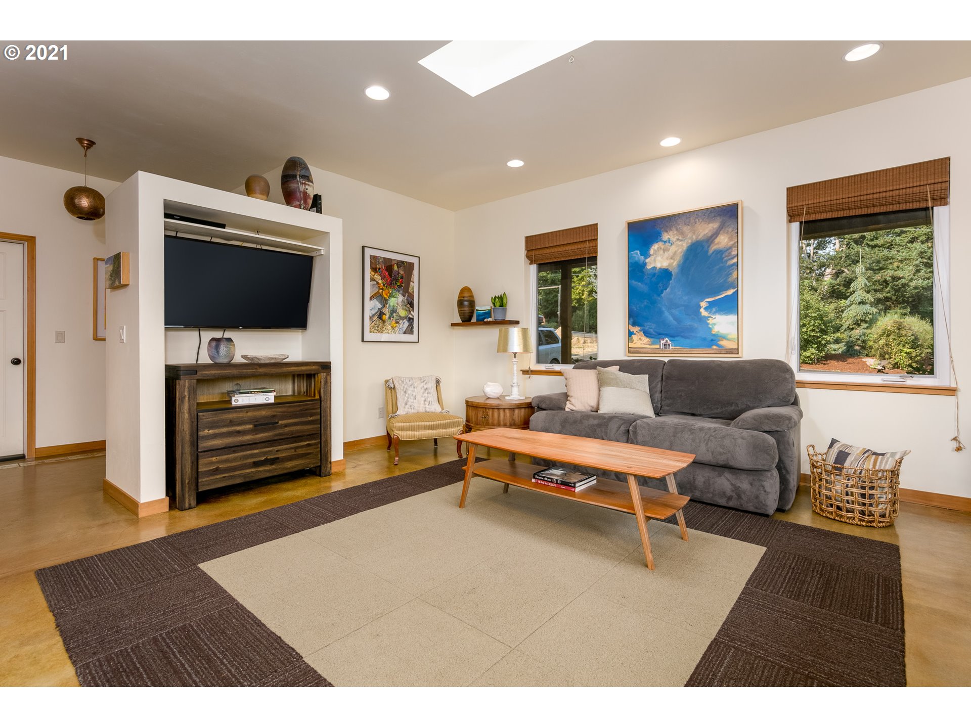 503 Frankton Road Hood River, OR 97031 - Photo 7 of 31 a living room with furniture a flat screen tv and a fireplace