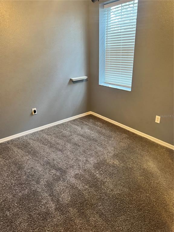 6315 Rosefinch Court, Unit 101 Lakewood Ranch, FL 34202 - Photo 17 of 30 an empty room with a window