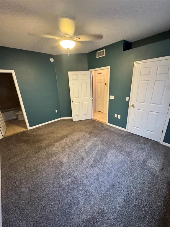 6315 Rosefinch Court, Unit 101 Lakewood Ranch, FL 34202 - Photo 20 of 30 a view of an empty room with a fireplace