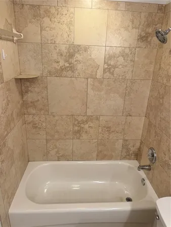 a bathroom with a bathtub