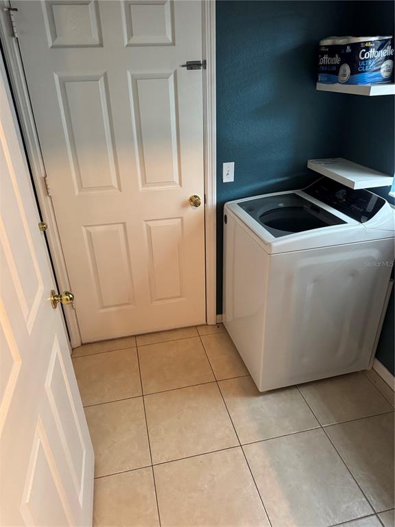 6315 Rosefinch Court, Unit 101 Lakewood Ranch, FL 34202 - Photo 25 of 30 a utility room with dryer and washer