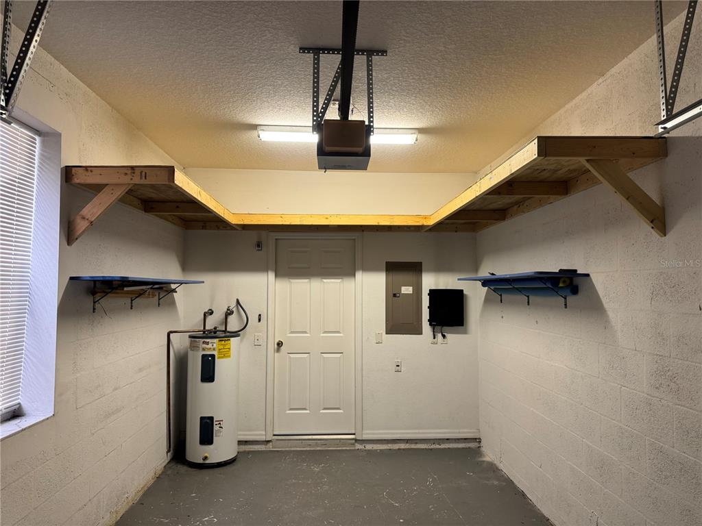 6315 Rosefinch Court, Unit 101 Lakewood Ranch, FL 34202 - Photo 29 of 30 a view of storage and utility room