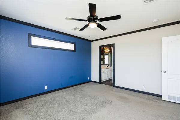 a view of room with workspace and a window