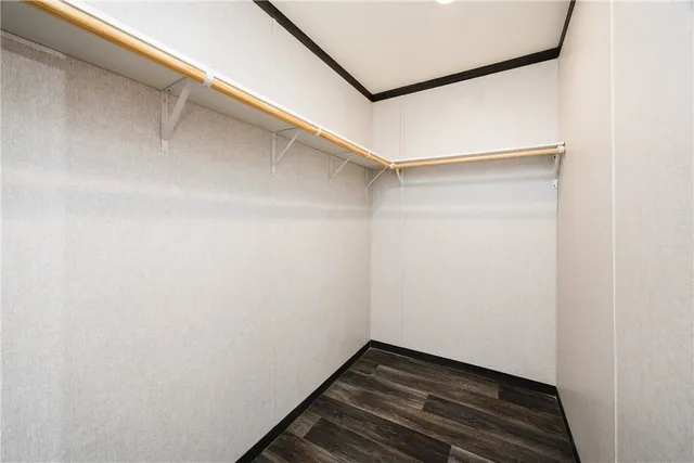a view of an empty walk in closet