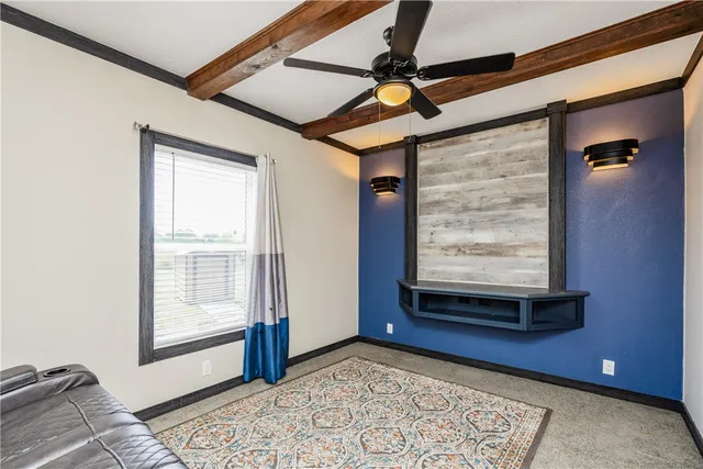 a view of an empty room and window