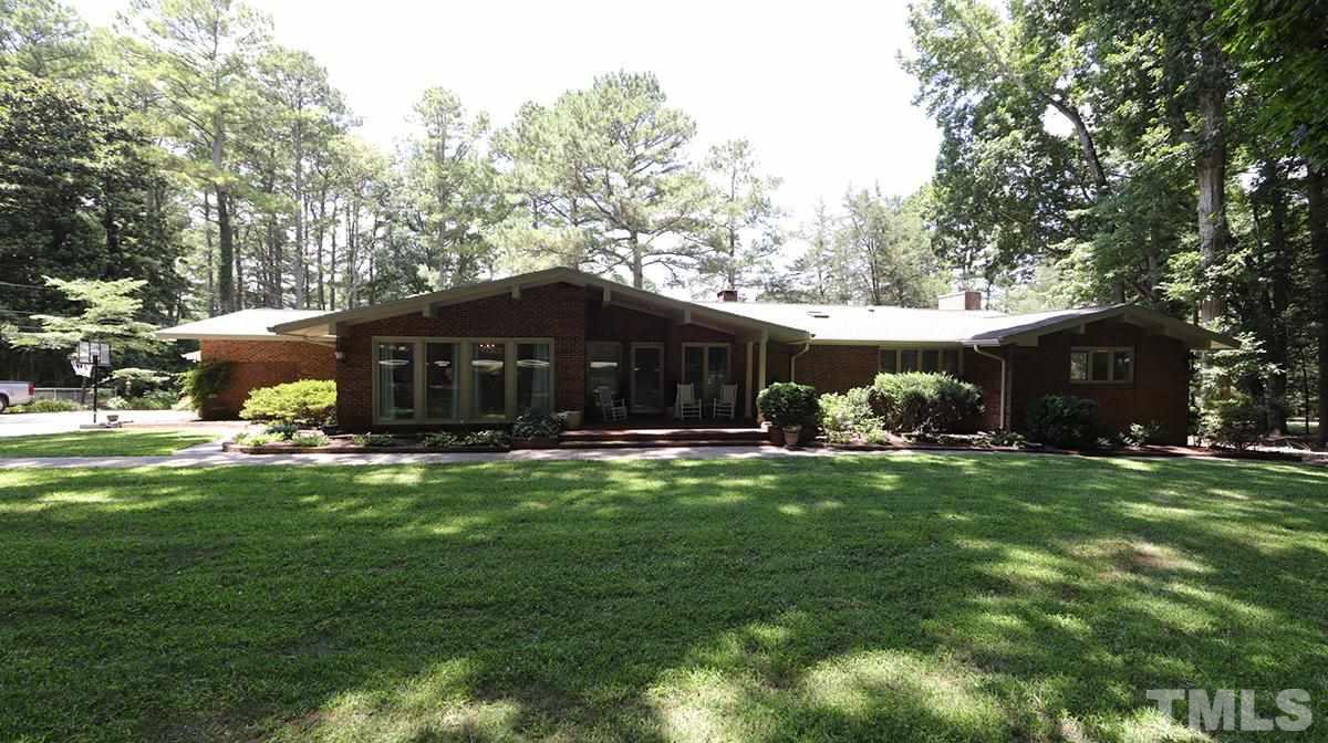 .9 AC Private lot w/ mature hardwoods. All Brick Ranch w/ 4 Bed/3.5 baths PLUS, attached 975 SF in-law Apartment updated in the past 2 years.  Multi-Generational