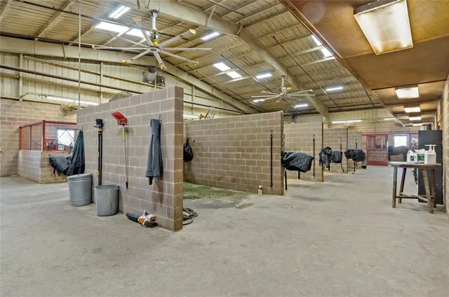 a view of a hallway with seating space