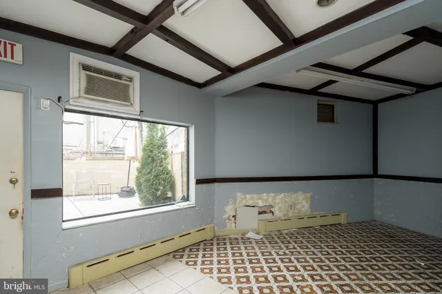 a view of roof deck with furniture