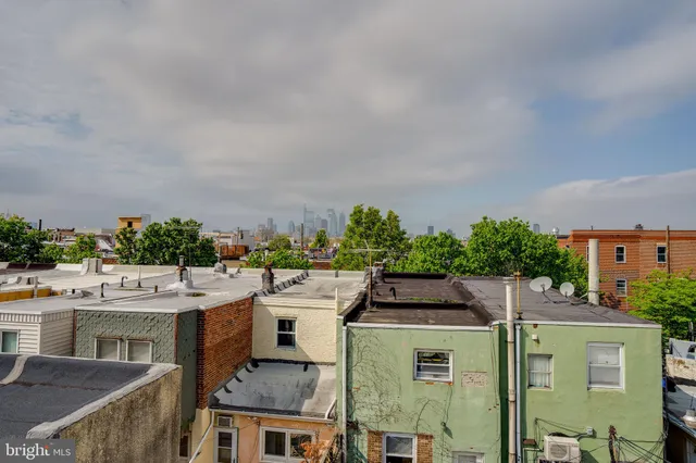 a view of front door and potted plants
