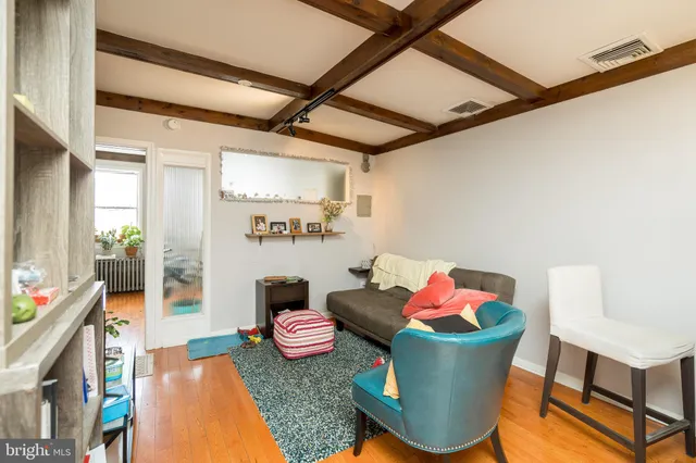 a kitchen with stainless steel appliances granite countertop a sink stove and microwave