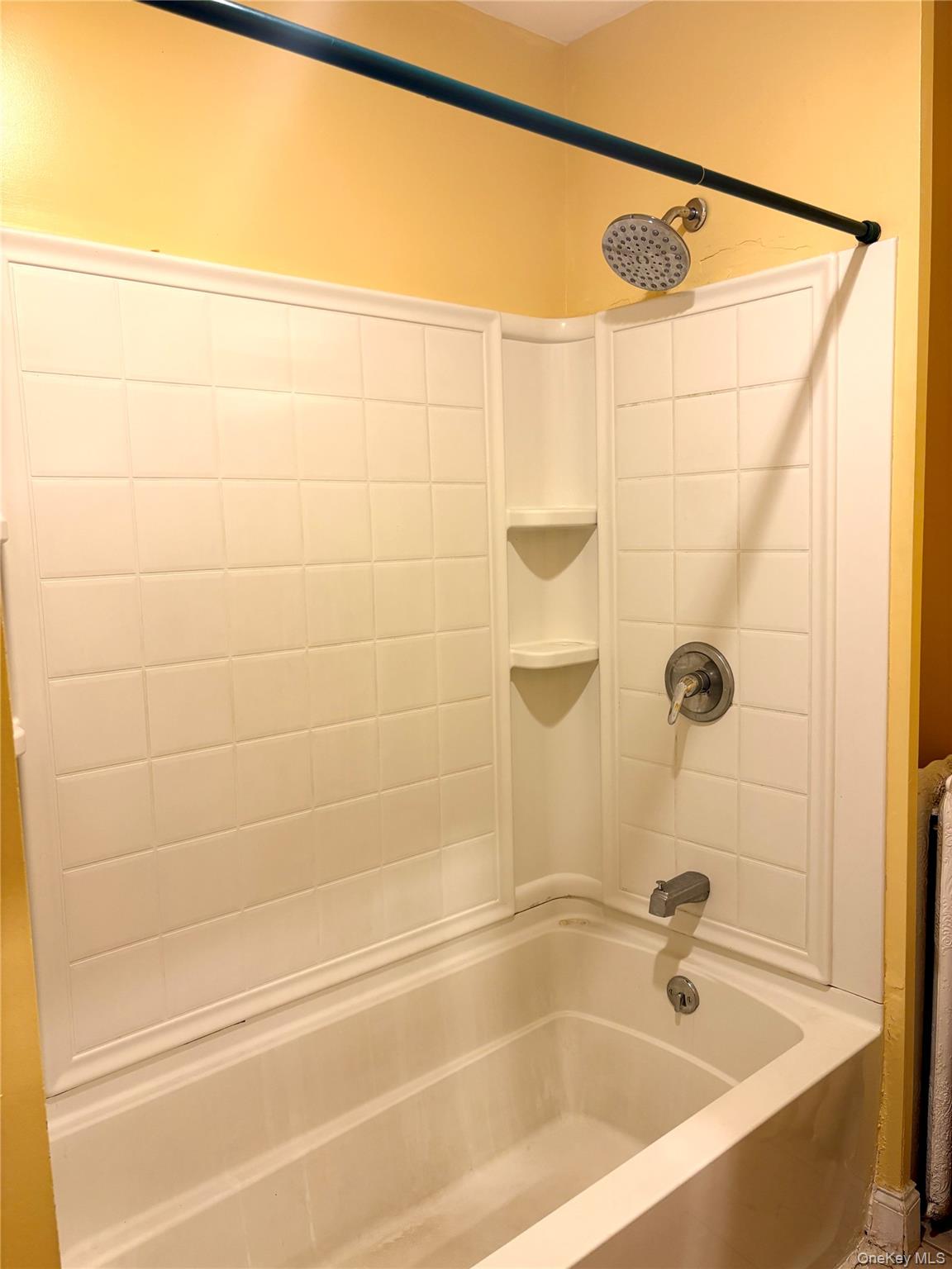2 Morris Avenue, Unit 203 Cold Spring, NY 10516 - Photo 14 of 32 a bathroom with a shower and a bath tub