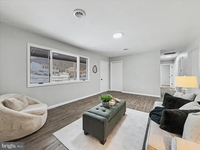 a living room with furniture and a couch