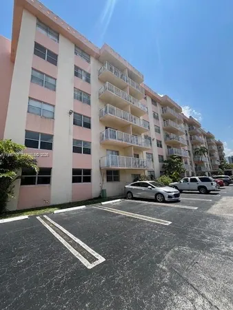 a front view of a building with street view