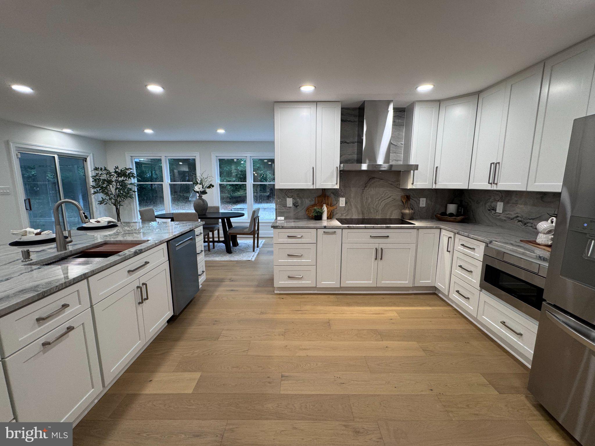 1132 Springvale Road Great Falls, VA 22066 - Photo 4 of 18 Modern kitchen with sleek design.