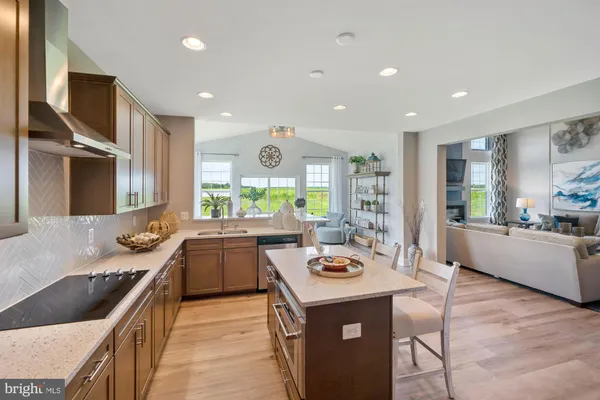 a kitchen with a sink and stove