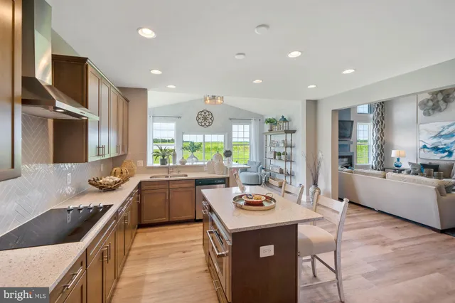 a kitchen with a sink and stove