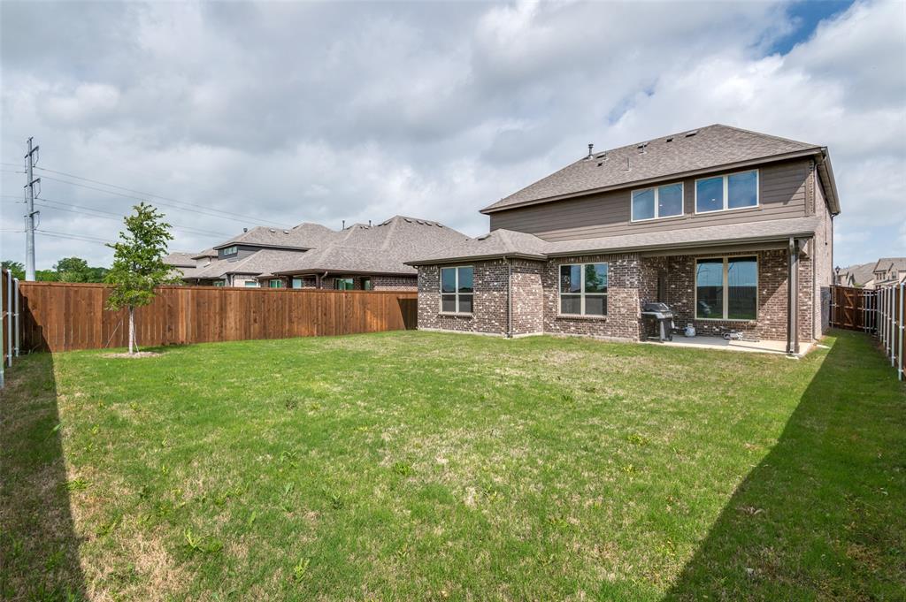 1749 Wassel Road Fort Worth, TX 76052 - Photo 25 of 25 a view of a house with a yard and sitting area