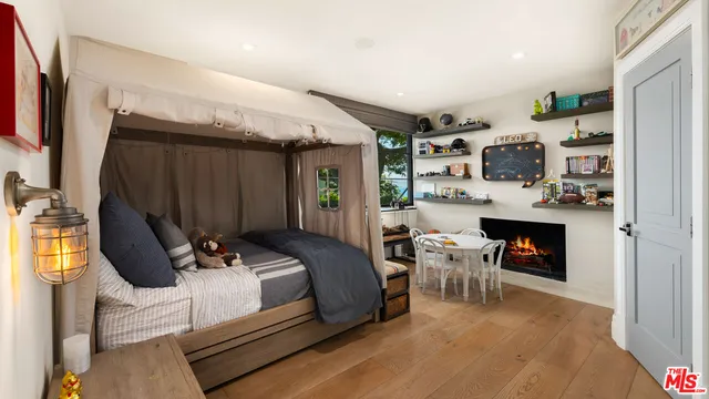 a bathroom with a granite countertop sink and mirror
