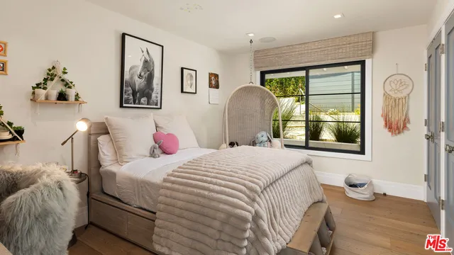 a bathroom with a sink vanity and a mirror