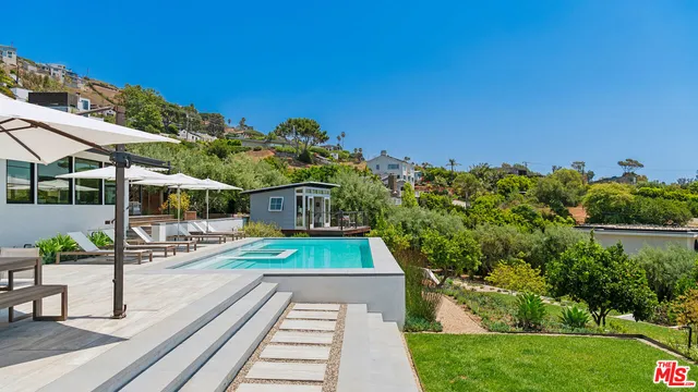 a view of a golf course with a lake