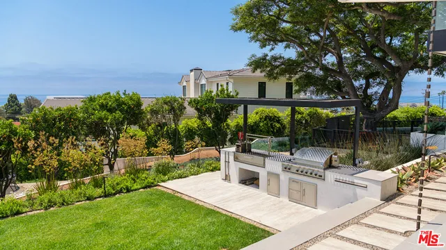 a view of a bench in a backyard