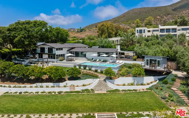 a view of a house with a big yard