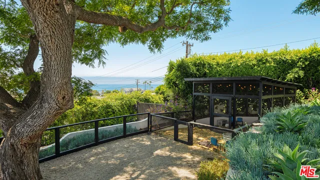a view of swimming pool with outdoor seating