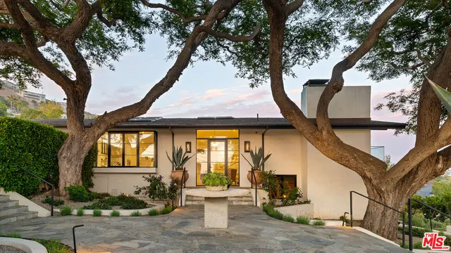 a view of a back yard of the house