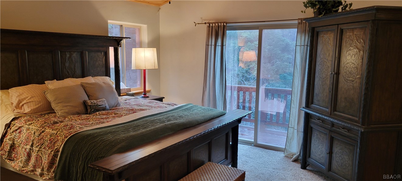 1685 Angels Camp Road Big Bear City, CA 92314 - Photo 16 of 35 a bedroom with a bed and a dresser