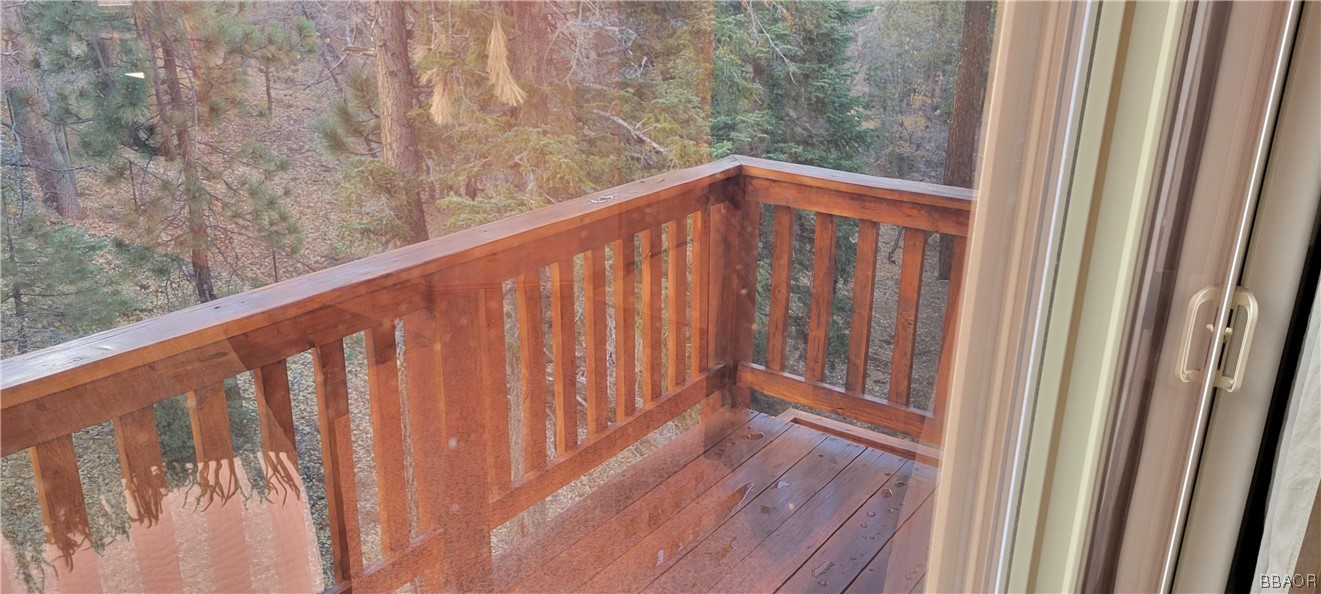1685 Angels Camp Road Big Bear City, CA 92314 - Photo 19 of 35 a view of wooden floor with a balcony