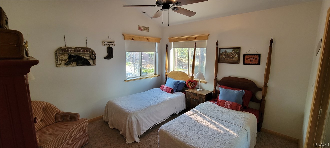 1685 Angels Camp Road Big Bear City, CA 92314 - Photo 22 of 35 a living room with furniture and a window