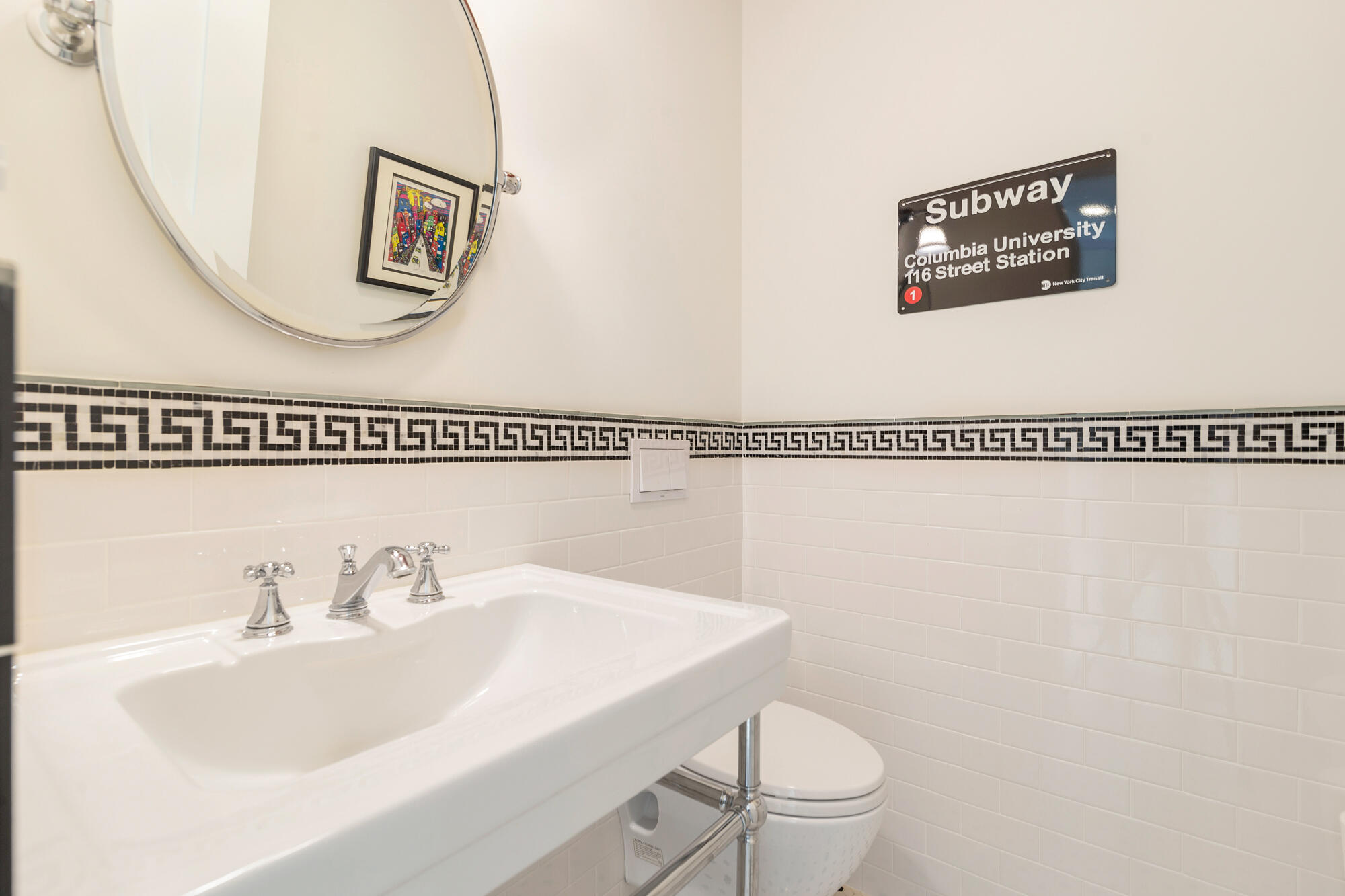 216 Colonial Lane Palm Beach, FL 33480 - Photo 17 of 48 a bathroom with a sink and a mirror