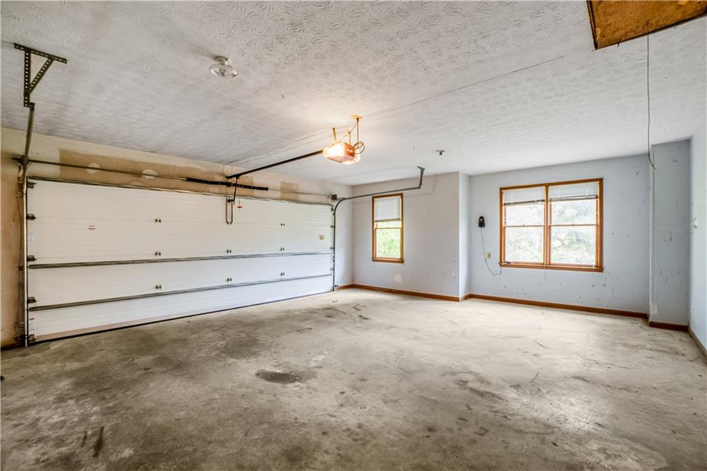 2177 Brooks Road Southeast Dacula, GA 30019 - Photo 27 of 42 an empty room with windows