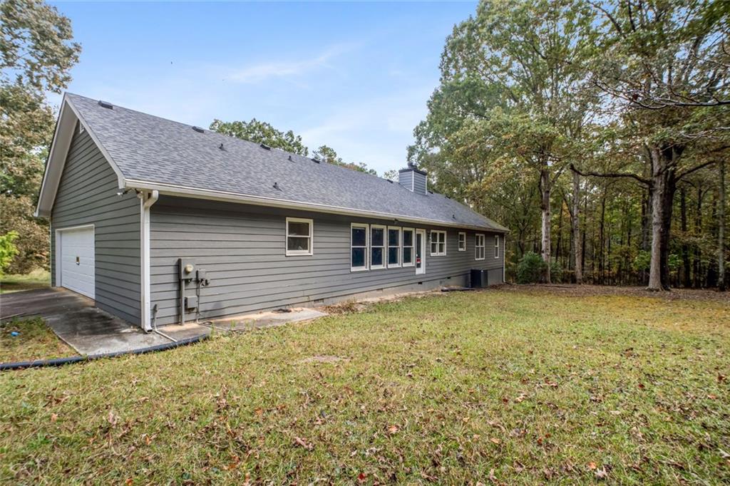 2177 Brooks Road Southeast Dacula, GA 30019 - Photo 3 of 42 a backyard of a house