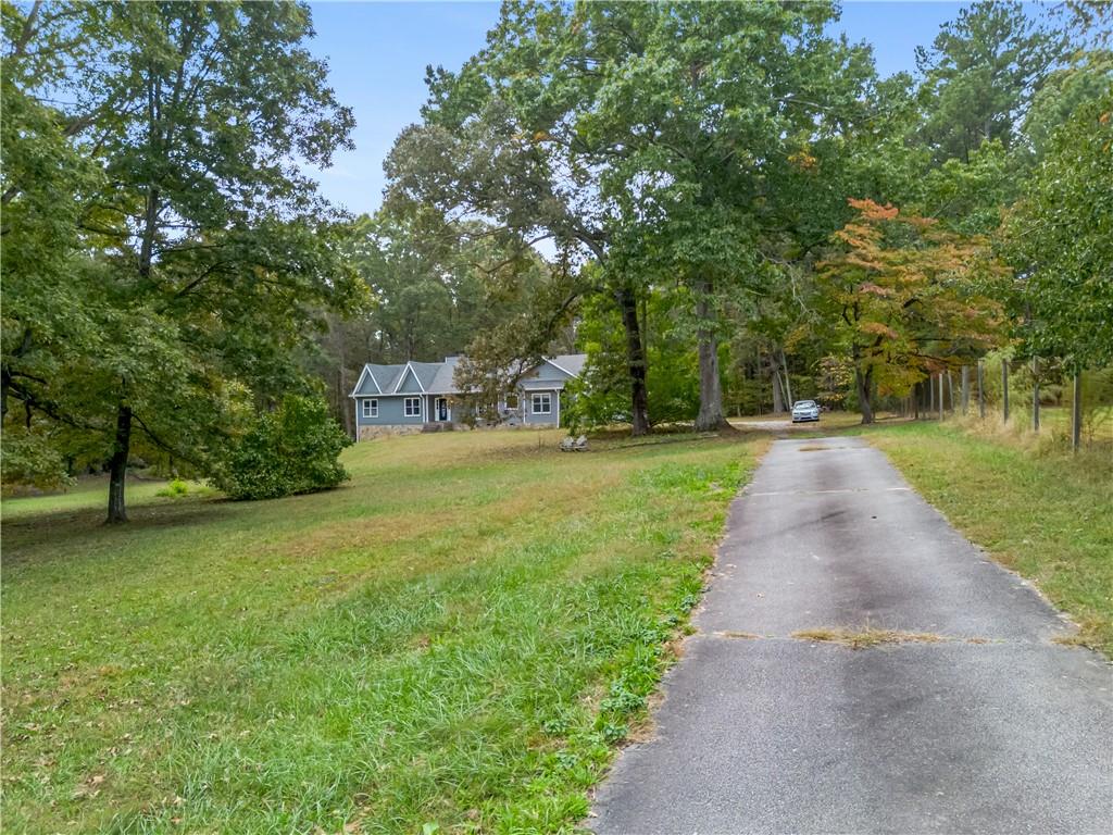 2177 Brooks Road Southeast Dacula, GA 30019 - Photo 33 of 42 a view of a park with large trees