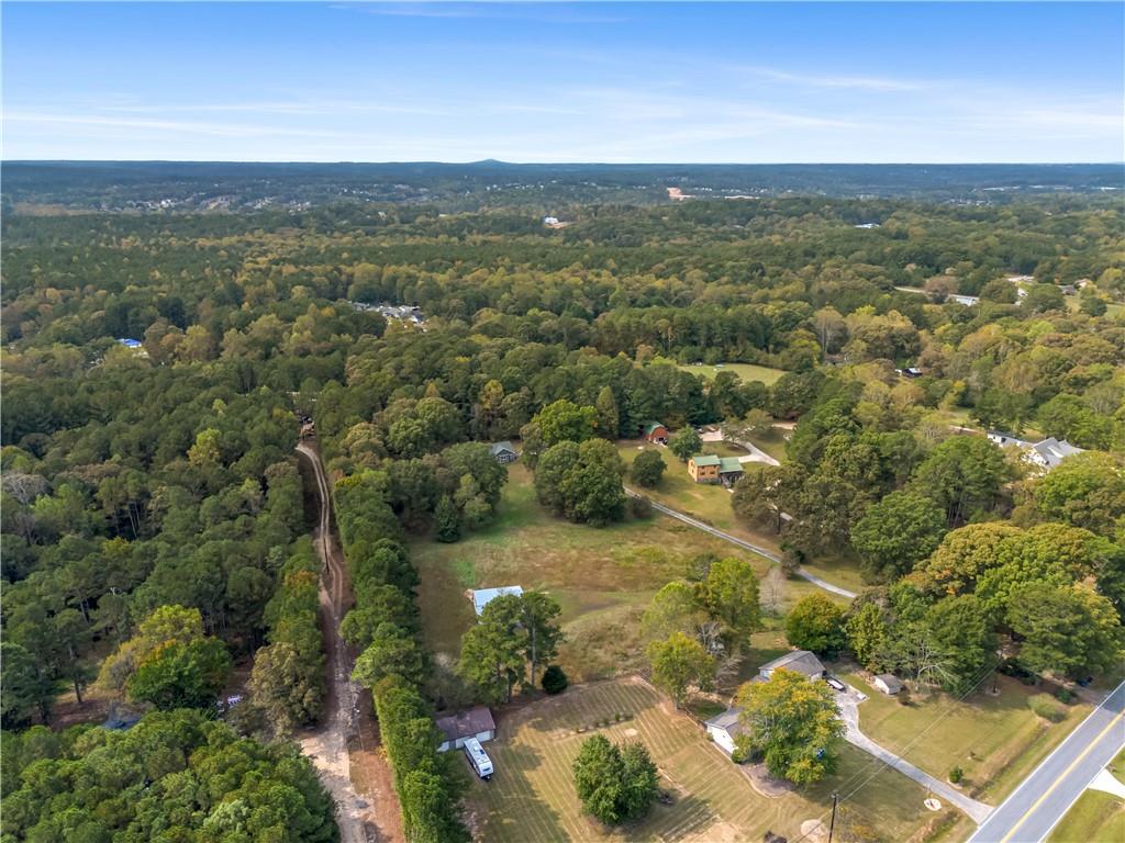 2177 Brooks Road Southeast Dacula, GA 30019 - Photo 36 of 42 an aerial view of residential houses with outdoor space