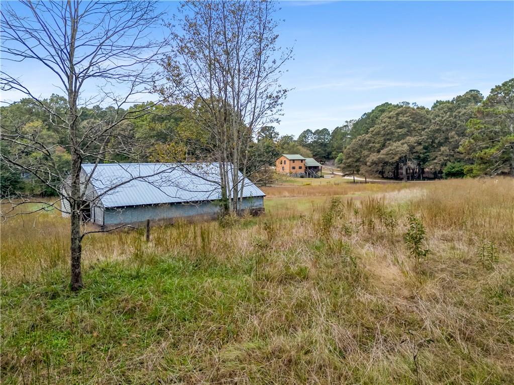 2177 Brooks Road Southeast Dacula, GA 30019 - Photo 41 of 42 a view of a lake with outdoor space